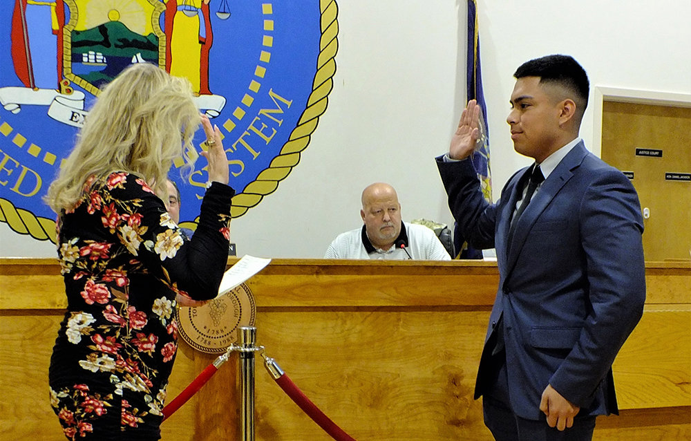 Kevin Coronel was sworn in by Town Clerk Colleen Corcoran.